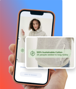 Phone graphic with a woman wearing a grey jumper with a message "100% sustainable cotton. 26 people added to bag today"
