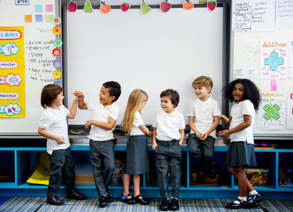 School children in front of a whiteboard